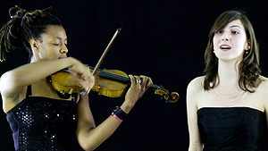 Still image of singer and violinist from Janet Biggs video Duet