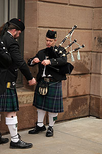 Bagpipers. Video still from "Coming Attractions" 2008, Janet Biggs