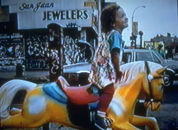Eda Faye on the Coin-Operated Horse