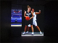 Still from Janet Biggs Video Installation 'One on One' - Connecticut women's basketball players Morgan Valley and Maria Conlon